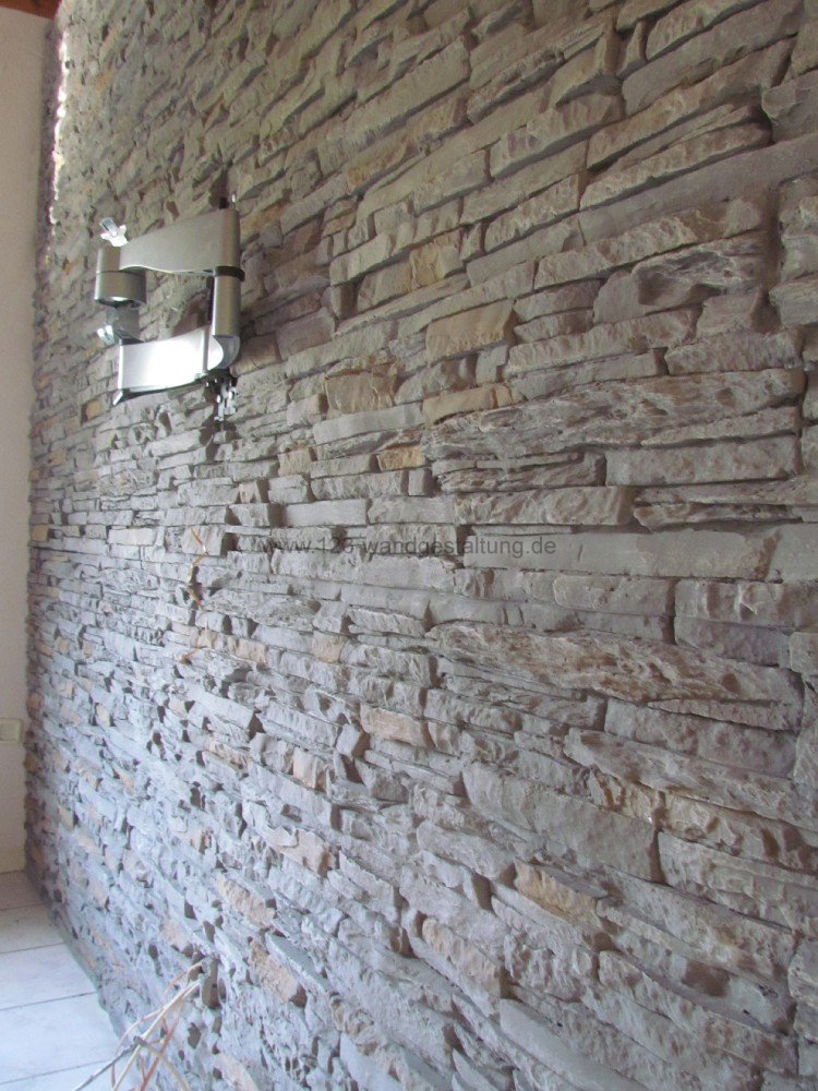 Der partner für kreative wandgestaltung und fassadenverkleidung Mediterranes wohnzimmer mit steinwand
